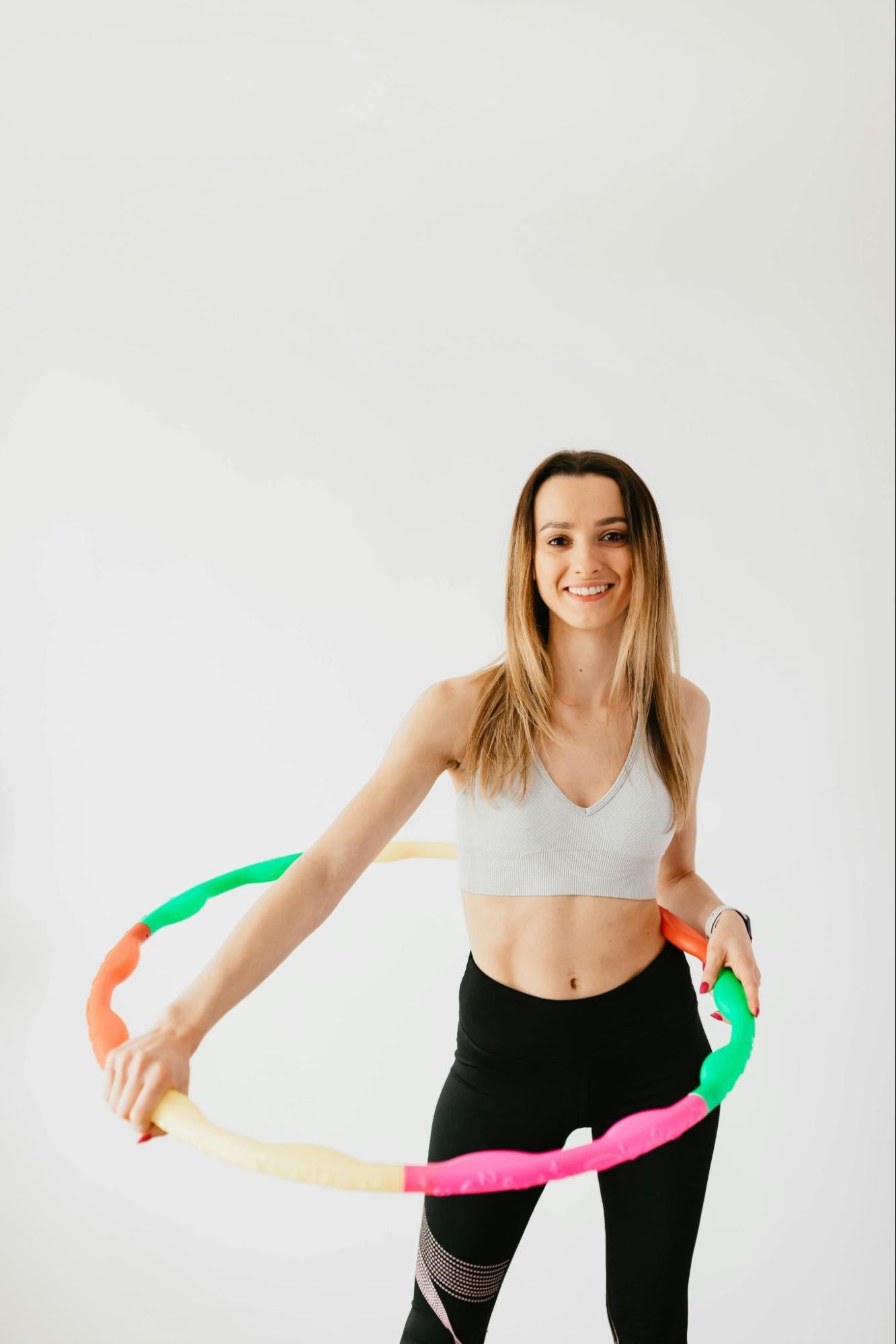 Woman with Hula Hoop in Workout Outfit