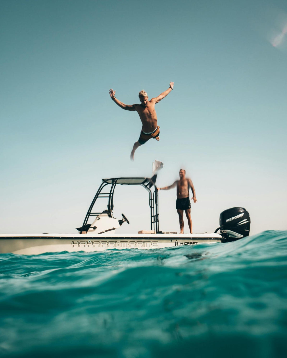 Person Diving into a Pool