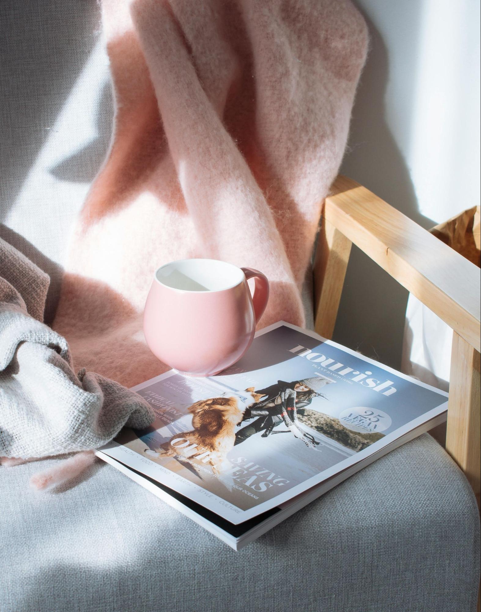 Pink Coffee Cup and Magazine