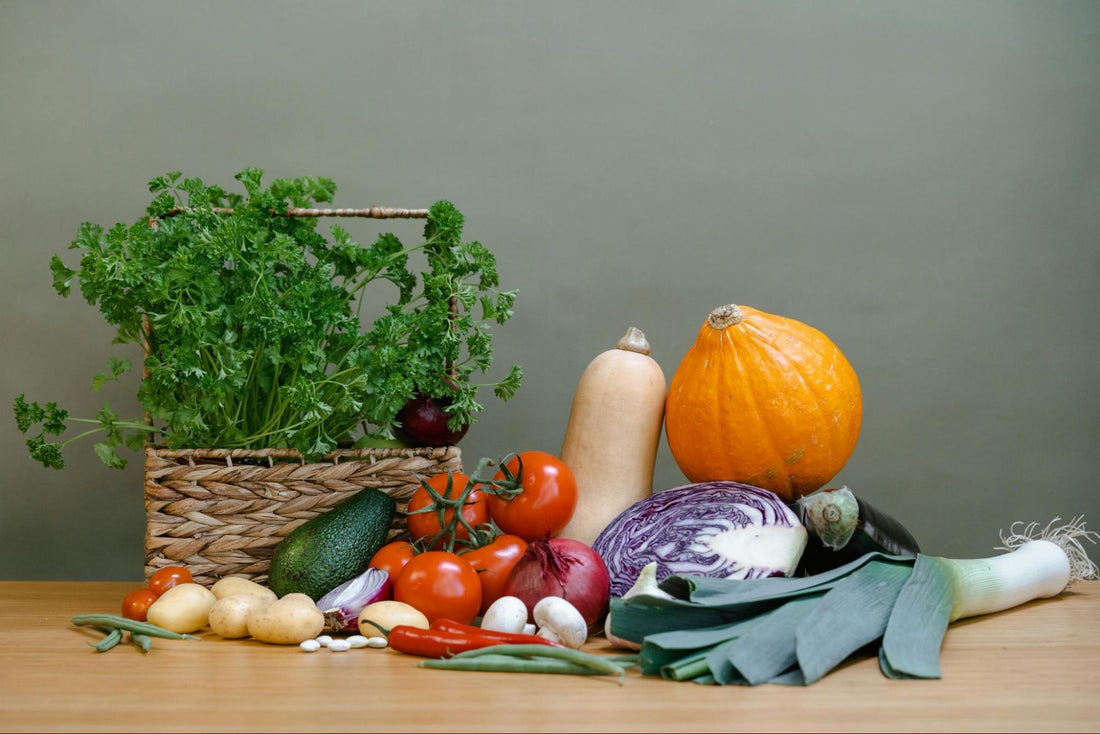 Vegetables Displayed with a Basket of Herbs